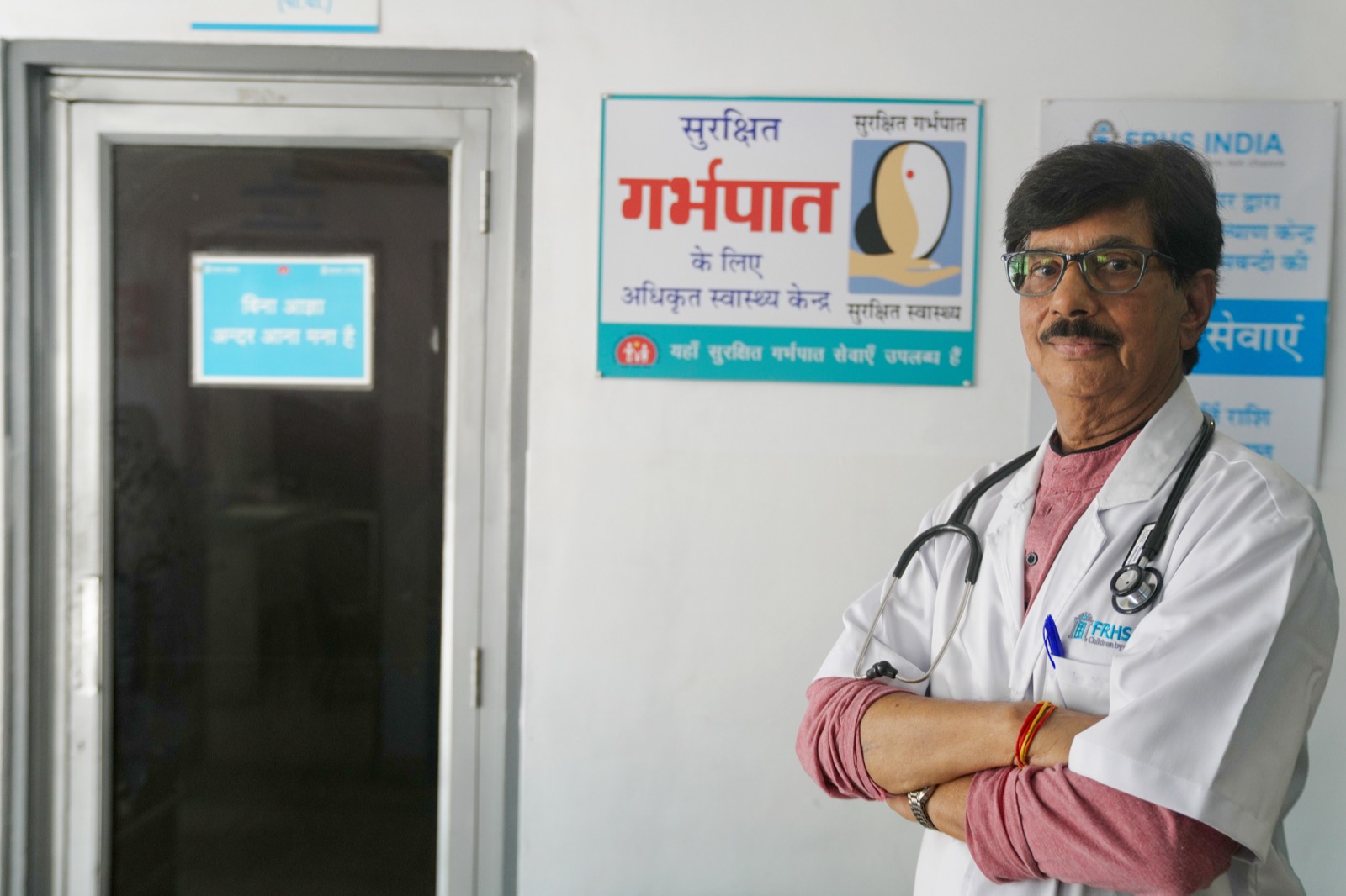 A clinician outside an FRHS India safe abortion facility